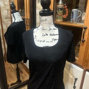 Kathy Ireland black short sleeved shirt